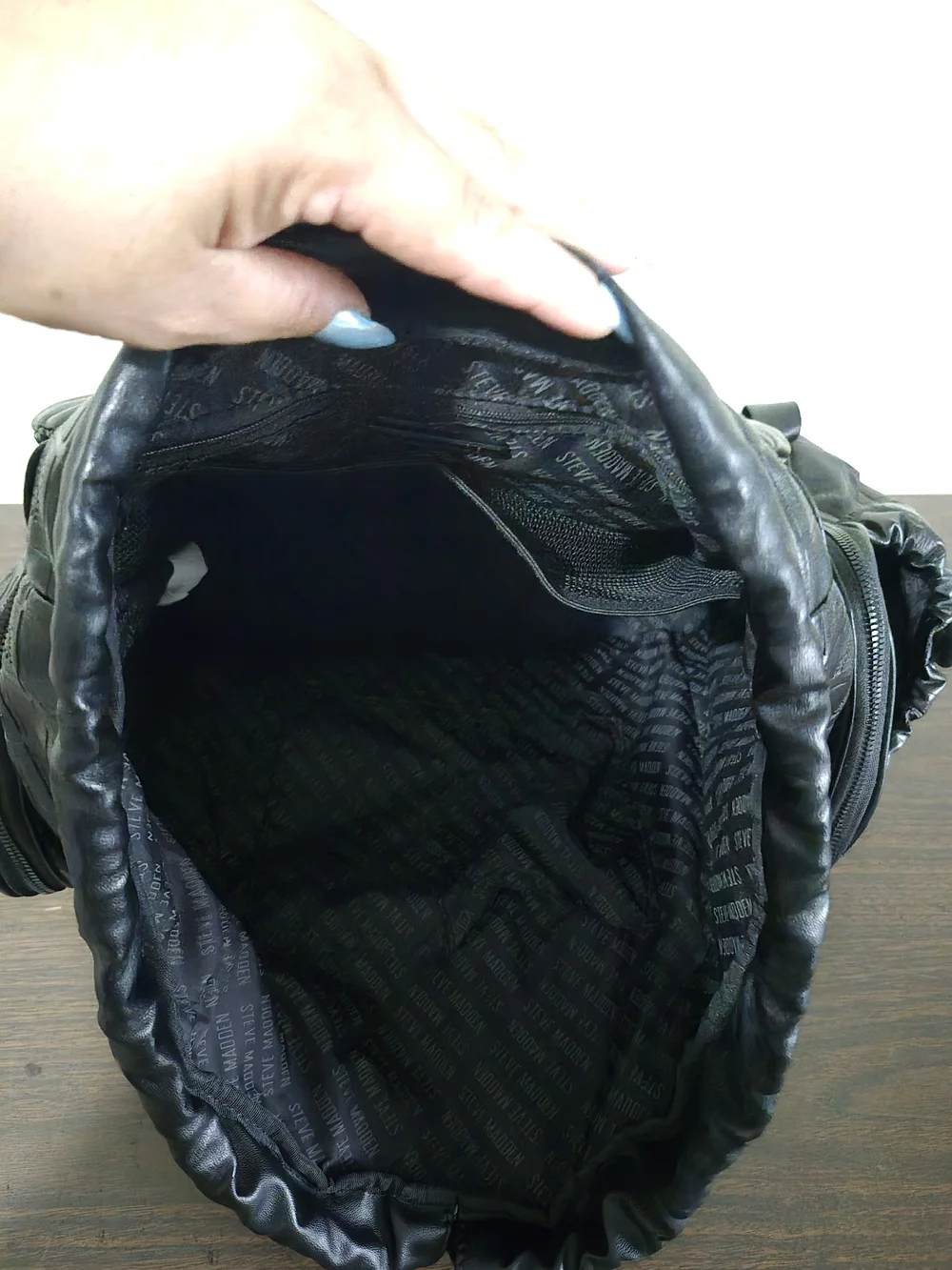 Steve Madden Black Embossed Leather Backpack